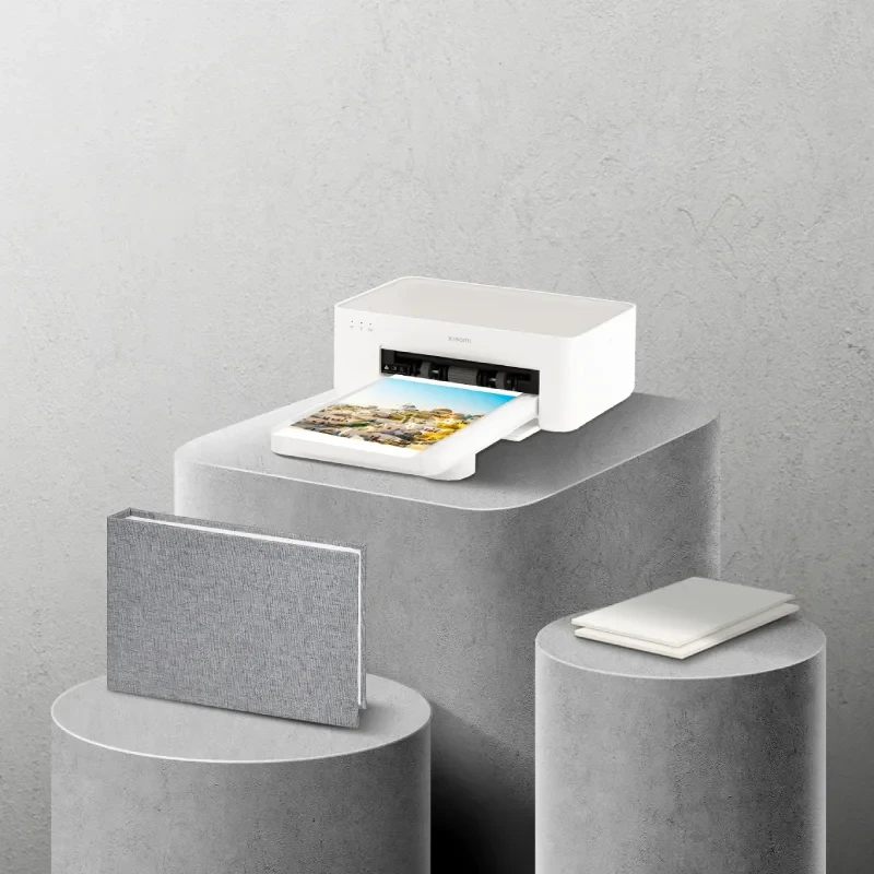 Xiaomi-Photo-Printer-1S-on-stone.webp